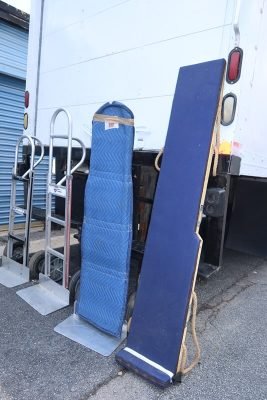 Moving dollies and protective pads prepared for loading at Boxed and Loaded Moving & Storage in Peachtree Corners